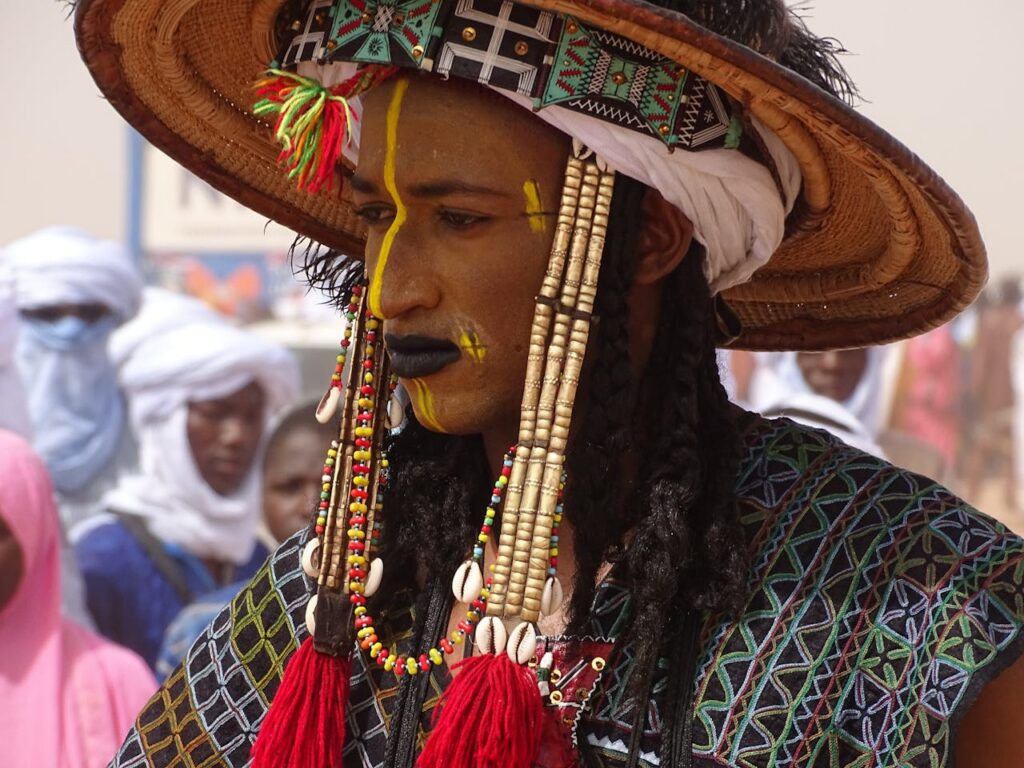 A man adorned in traditional Wodaabe attire during the Cure Salée festival in Niger.